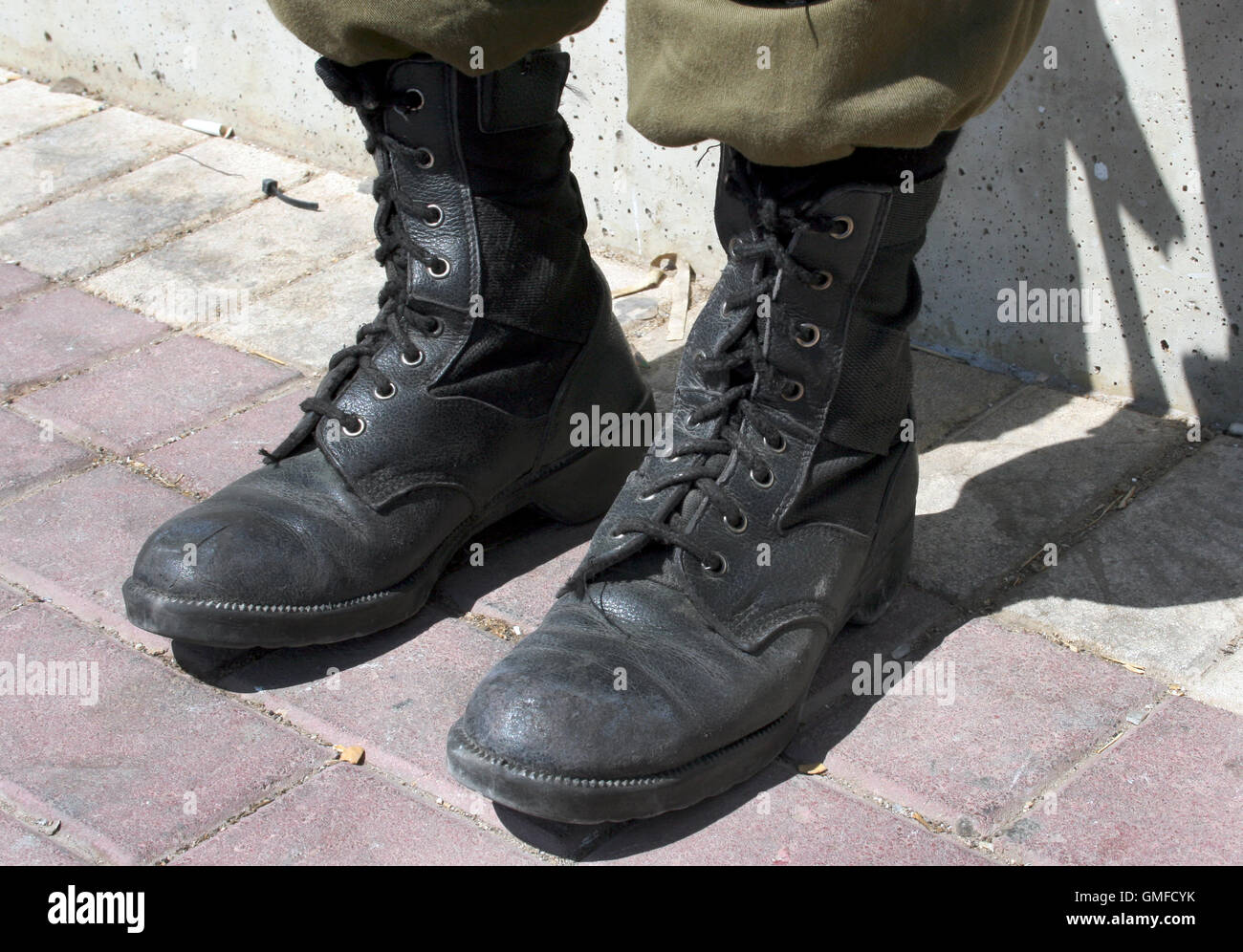 Soldier Daniela Joeli wears black synthetic boots the military base at  controller Makkabim between Israel and the Palestinian West Bank, Israel,  16 August 2016. The Israelian army offers vegan food since the