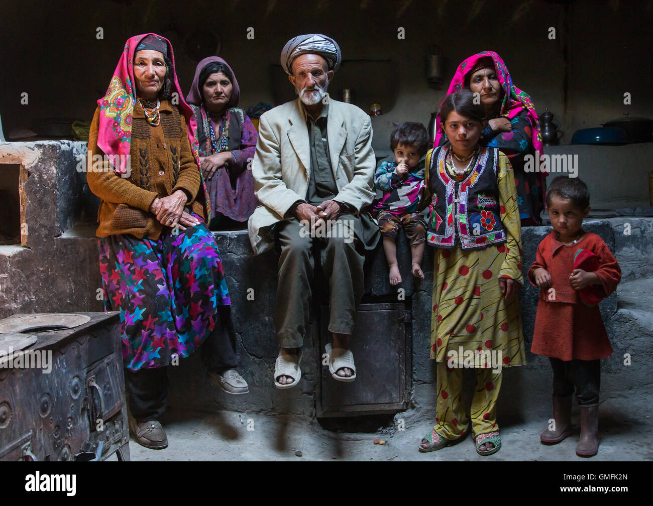 Afghan family inside their traditional pamiri house, Badakhshan province, Wuzed, Afghanistan
