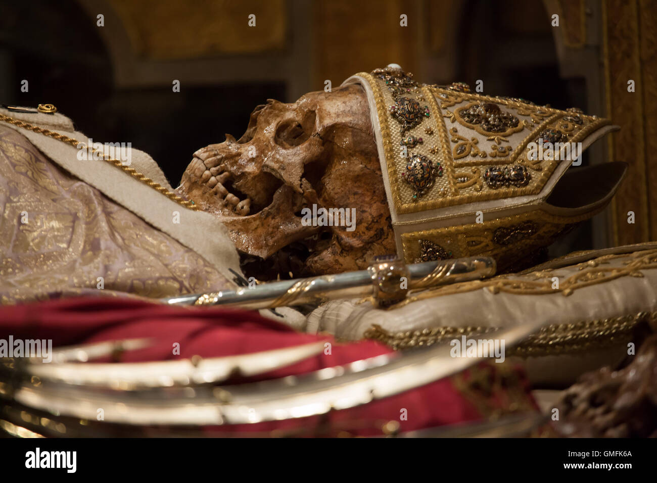 Skull of Saint Ambrose in the underground crypt of the Basilica di Sant'Ambrogio in Milan, Lombardy, Italy. Stock Photo
