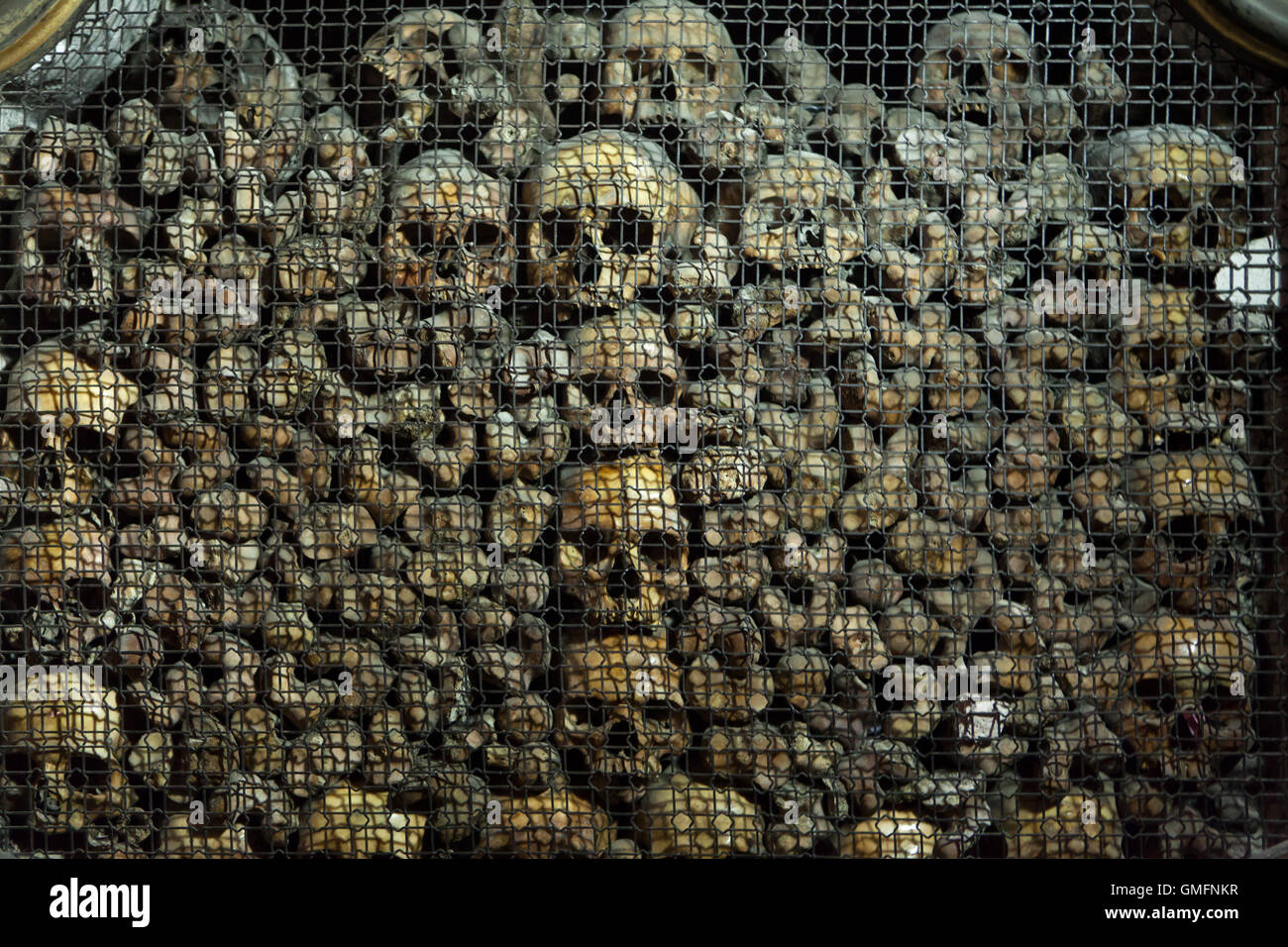 Human skulls and bones in the ossuary in the Church of San Bernardino alle Ossa in Milan, Lombardy, Italy. Stock Photo