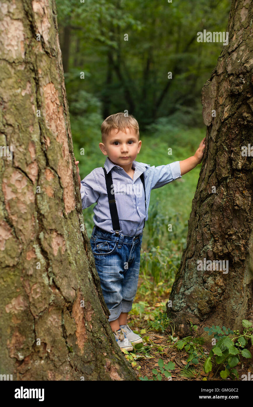Boy in stylish clothing posing for the camera Stock Photo