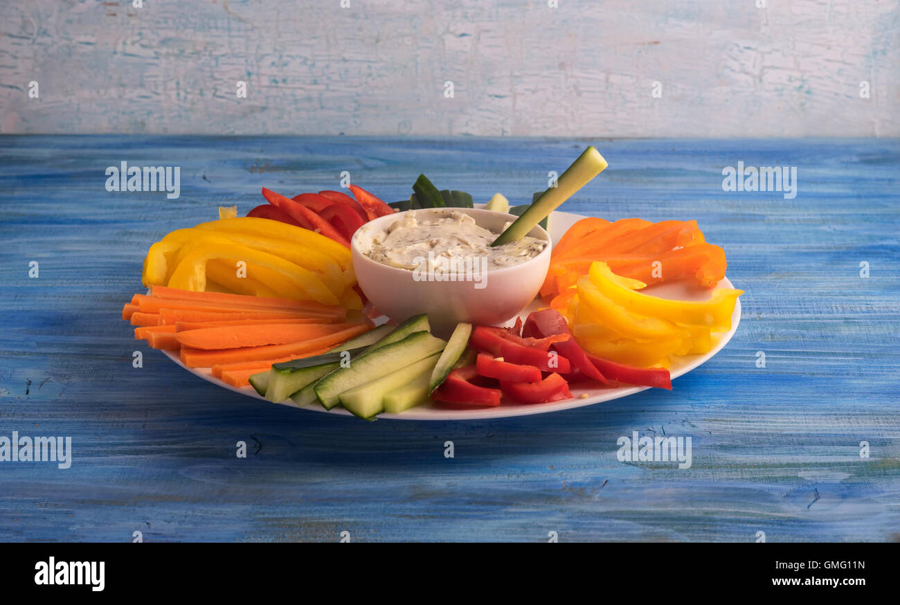 Plate of colorful vegetable sticks with dip sauce Stock Photo Alamy