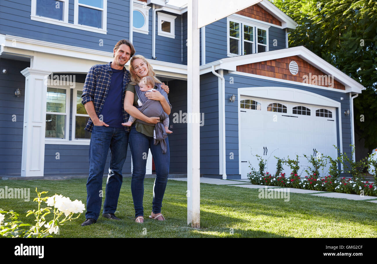 Portrait Of Family Standing Outside House Stock Photo - Alamy