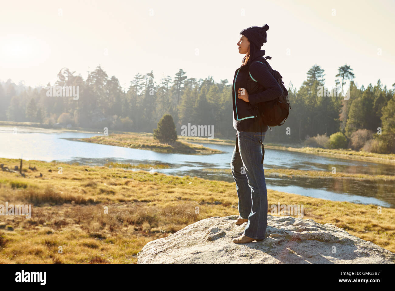 Woman alone standing in hi-res stock photography and images - Alamy