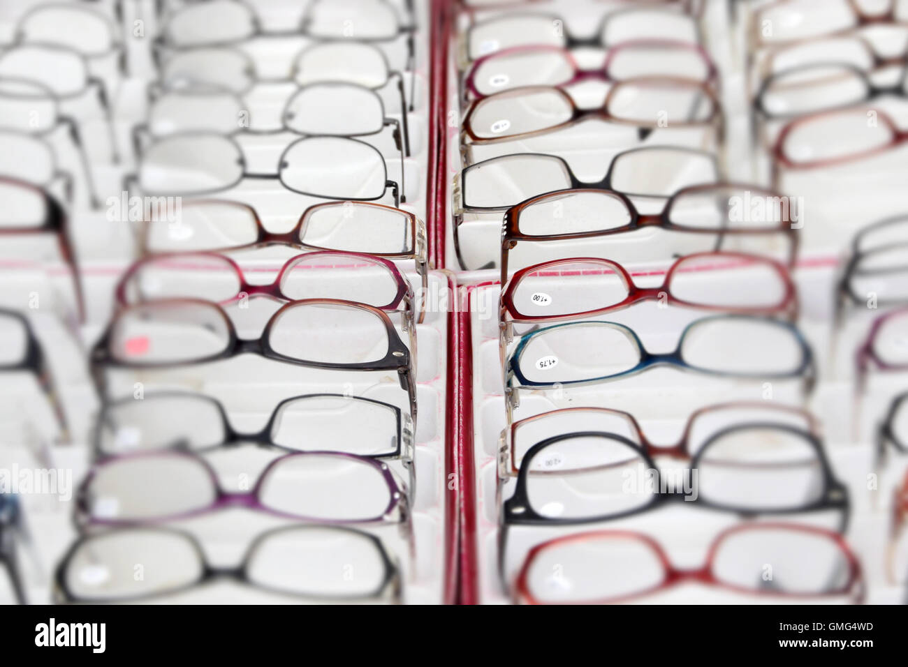 Presbyopia and myopia reading glasses background. Abstract center spot blur selective focus. Stock Photo