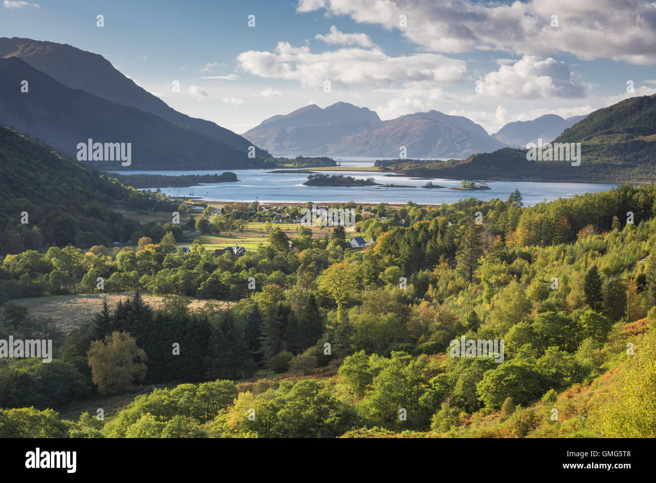 View over Glen Coe village to Loch Leven, Ballachulish bridge and Ardgour, Scottish Highlands Stock Photo