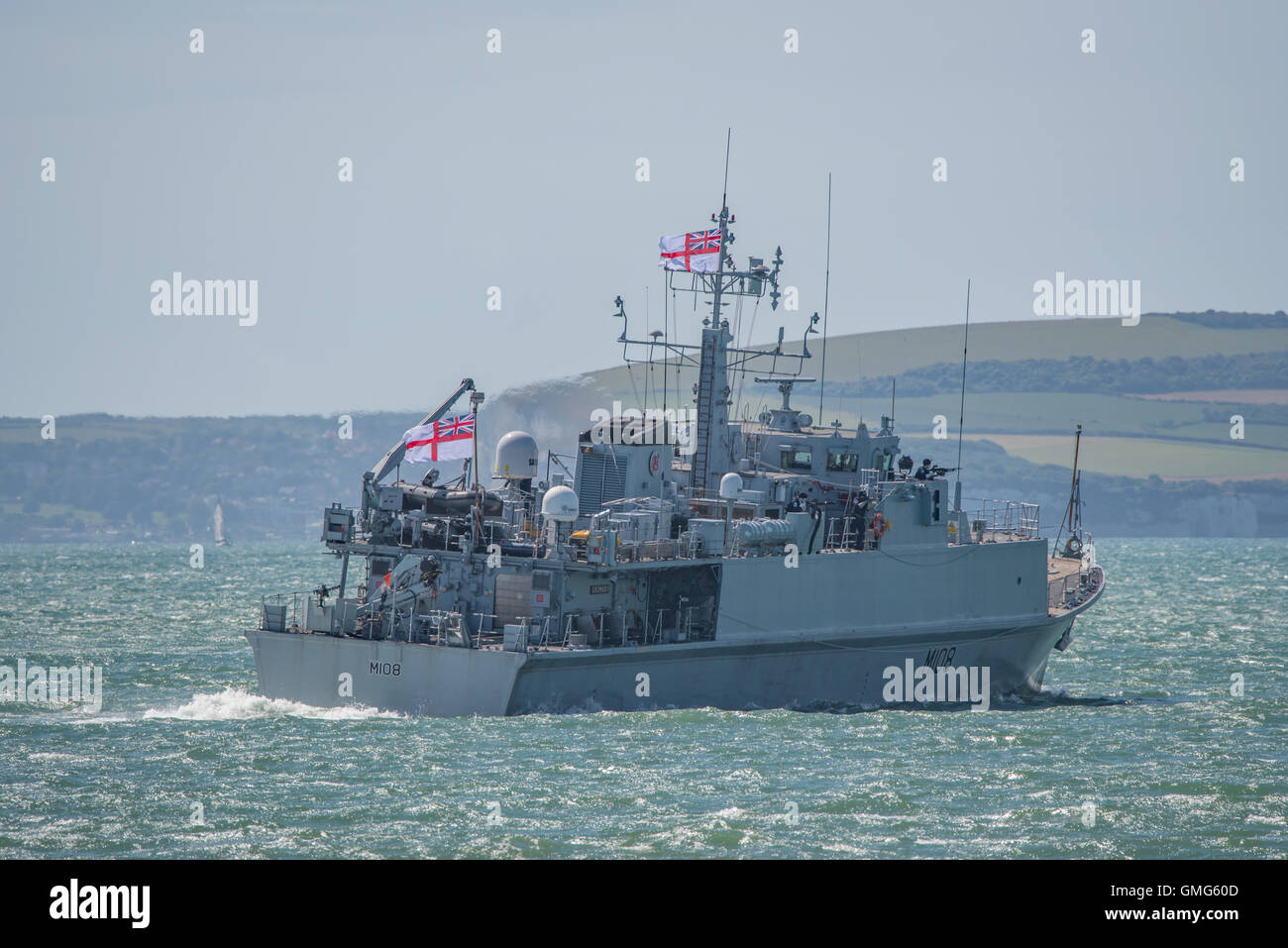 The British Royal Navy Mine Warfare Vessel, HMS Grimsby in demonstration action at Bournemouth Air Festival, UK on the 21st August 2016. Stock Photo