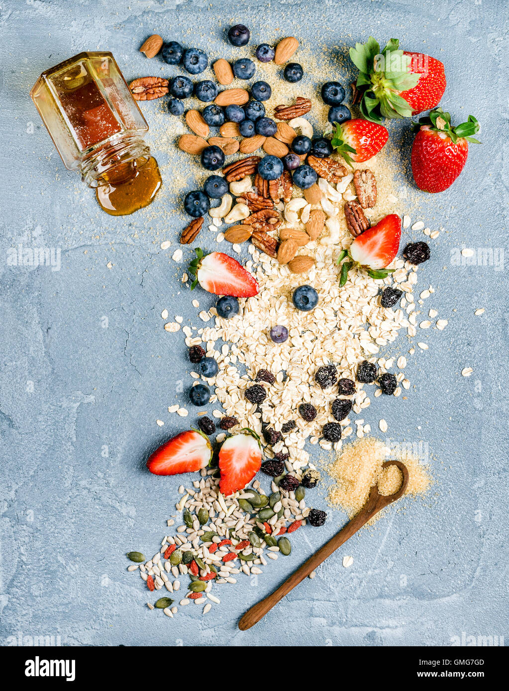 Ingredients for cooking healthy breakfast. Strawberries, blueberries