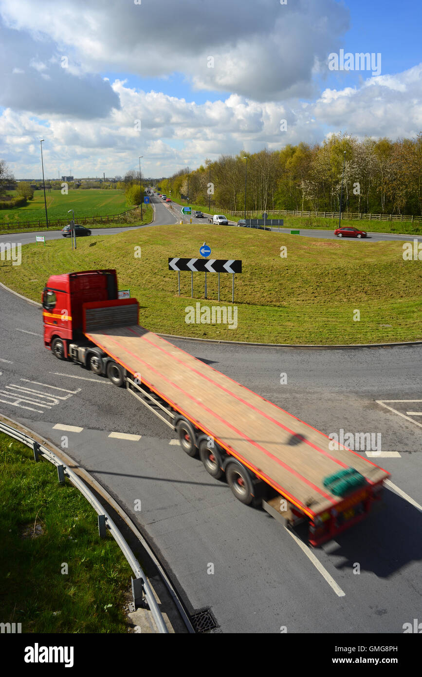 lorry travelling round roundabout selby yorkshire united kingdom Stock Photo