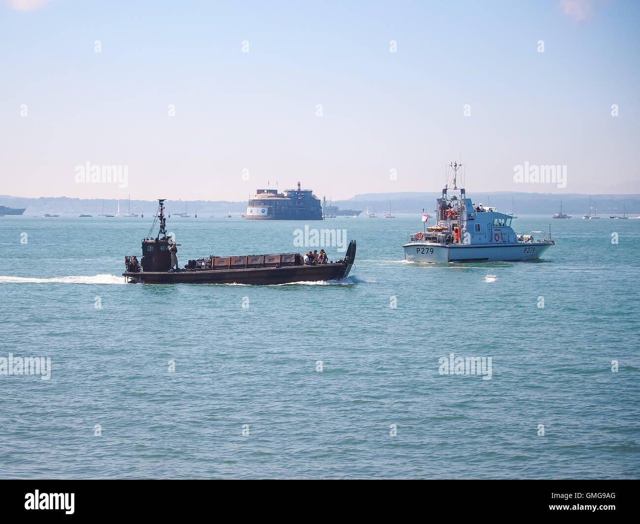 HMS Blazer, P279 and a Royal Marine Landing Craft Vehicle Personnel Mk5 in the Solent Stock Photo