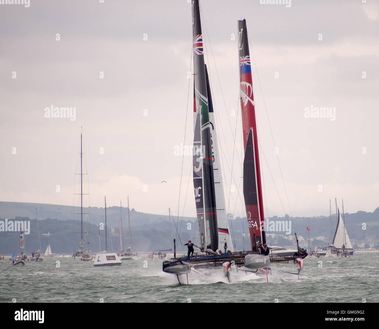 The C45 class catamarans of Team Emirates New Zealand and Ben Ainslie racing at the Americas Cup World Series in Portsmouth 2016 Stock Photo