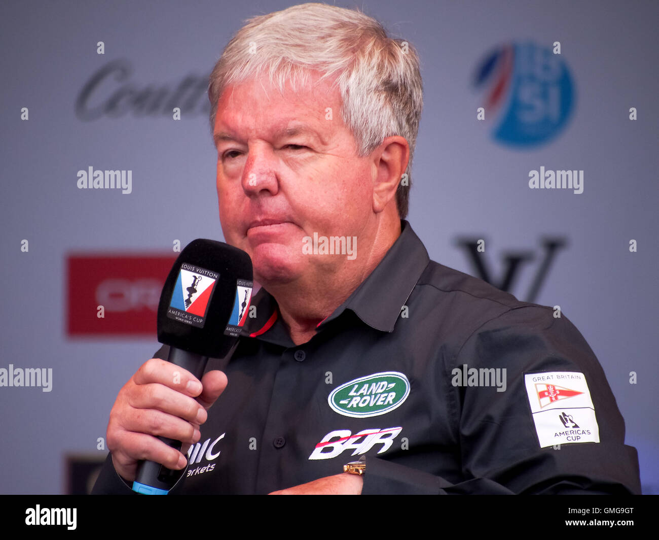 Sir Keith Mills GBE on stage at the Americas Cup World Series event in Portsmouth 2016 Stock Photo