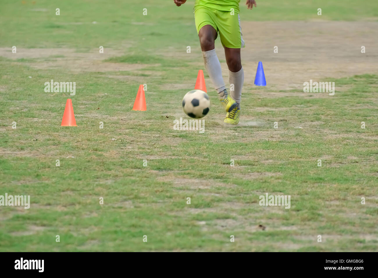 Soccer players practicing dribbling Stock Photo Alamy