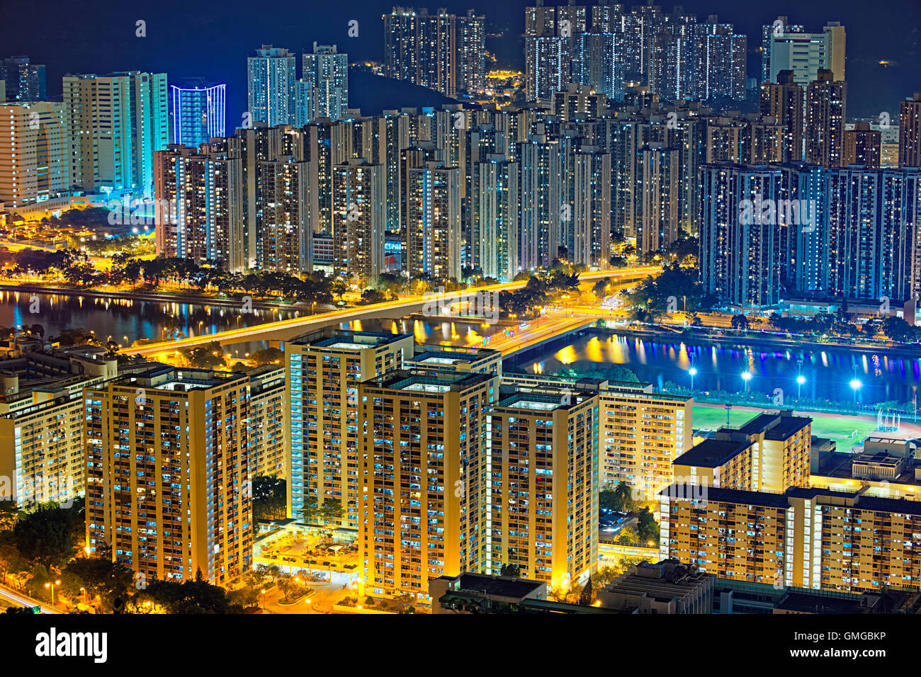 Residential building in Hong Kong at night Stock Photo - Alamy