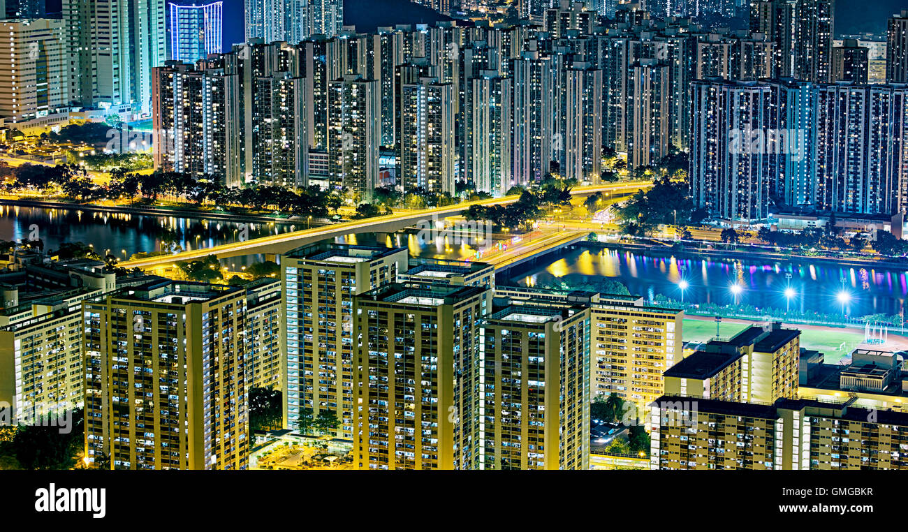 Residential building in Hong Kong at night Stock Photo - Alamy