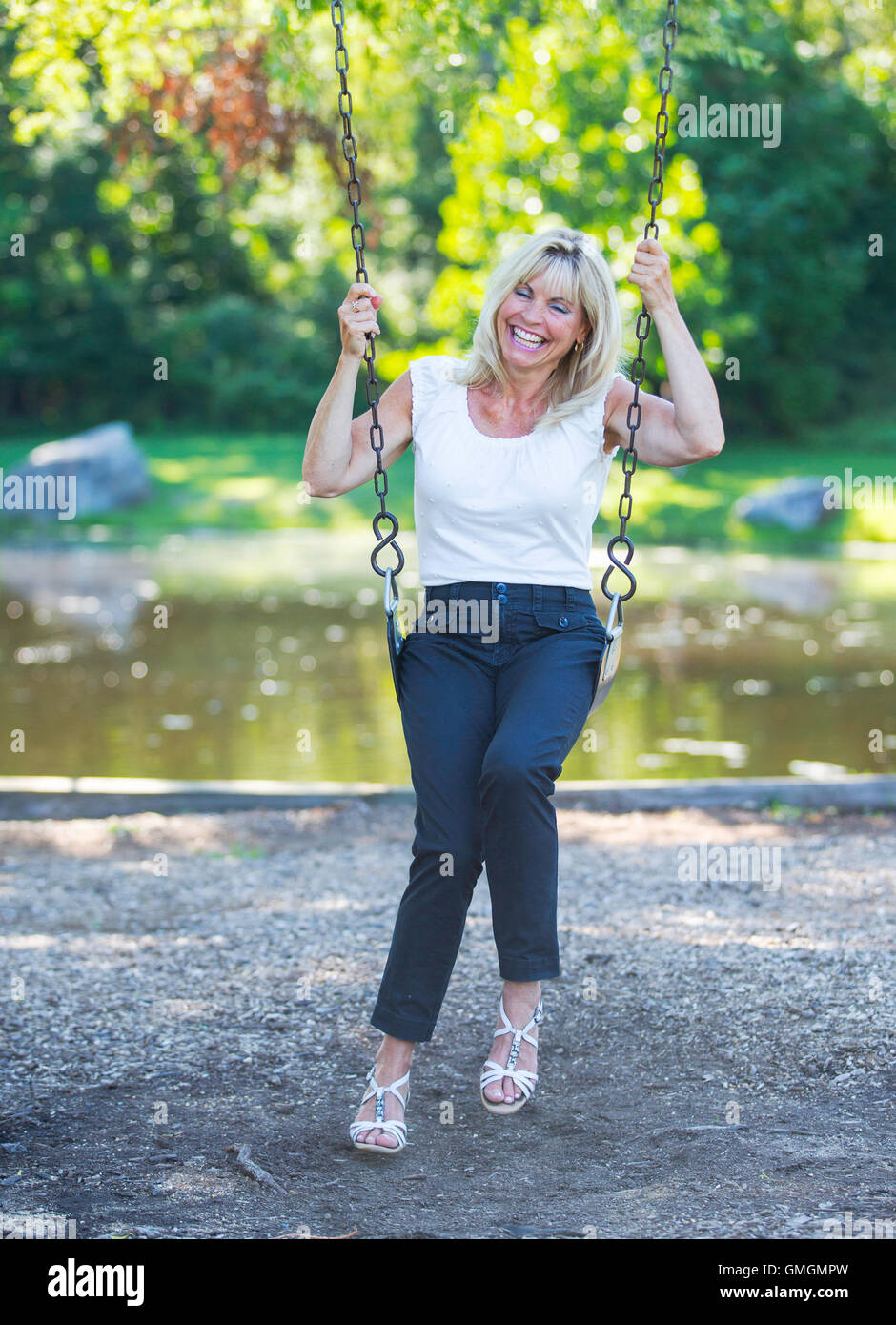 Adult female on a swing hi-res stock photography and images - Alamy