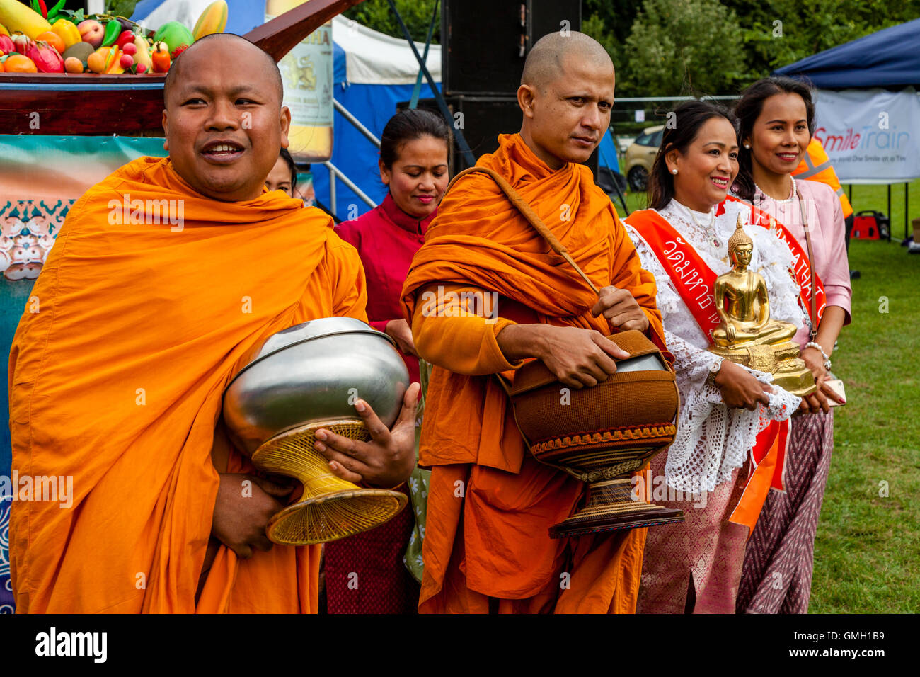 Thai Buddhist Monks Collecting Donated Food At The Brighton Thai
