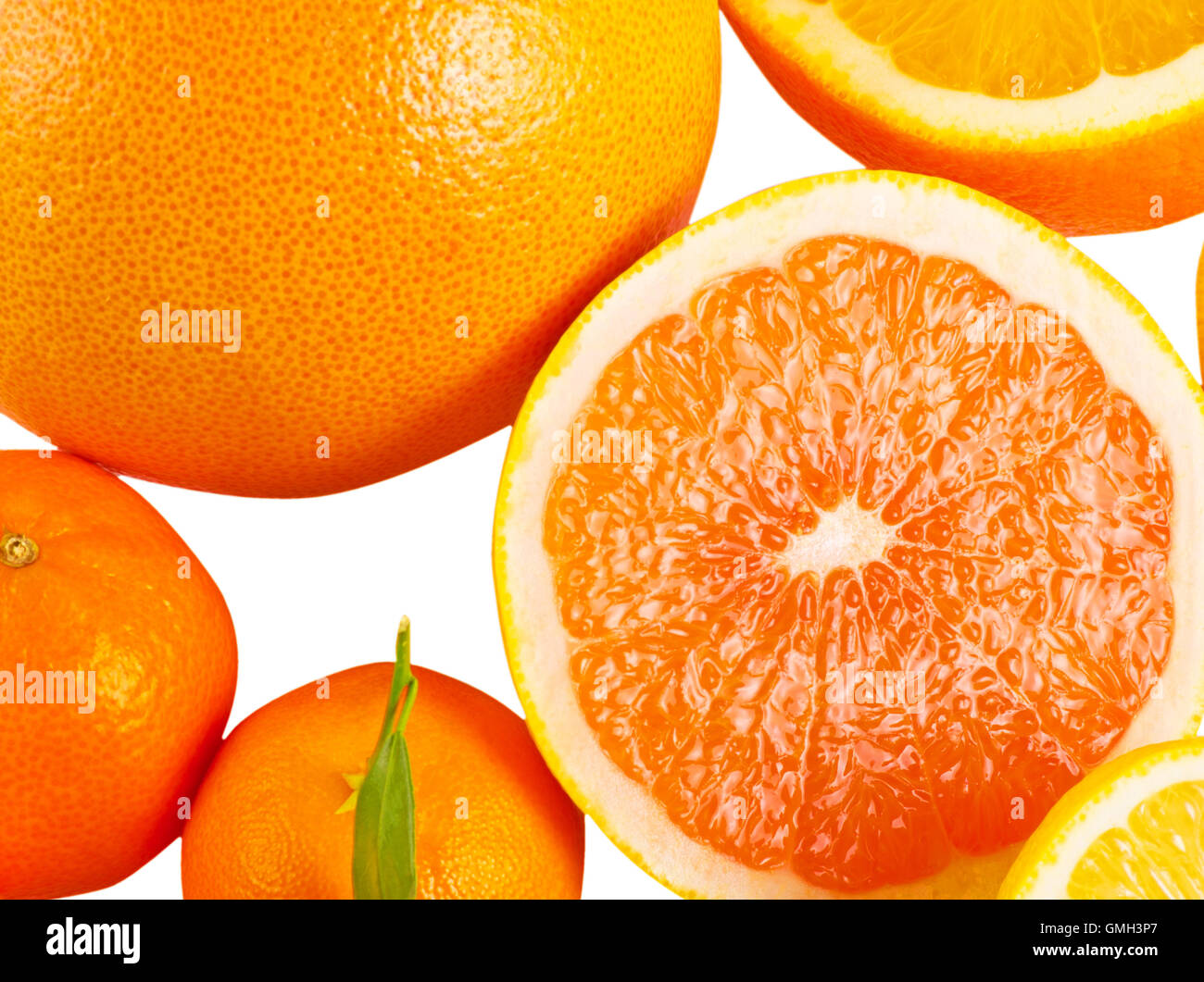 Vitamin c overload stacks of sliced fruit isolated on white stock