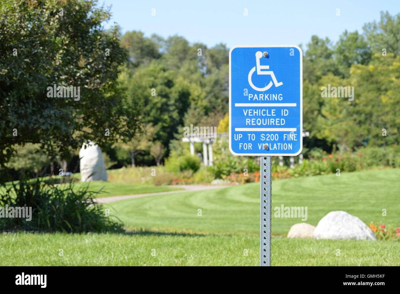 Handicap Parking Sign at the Park Stock Photo
