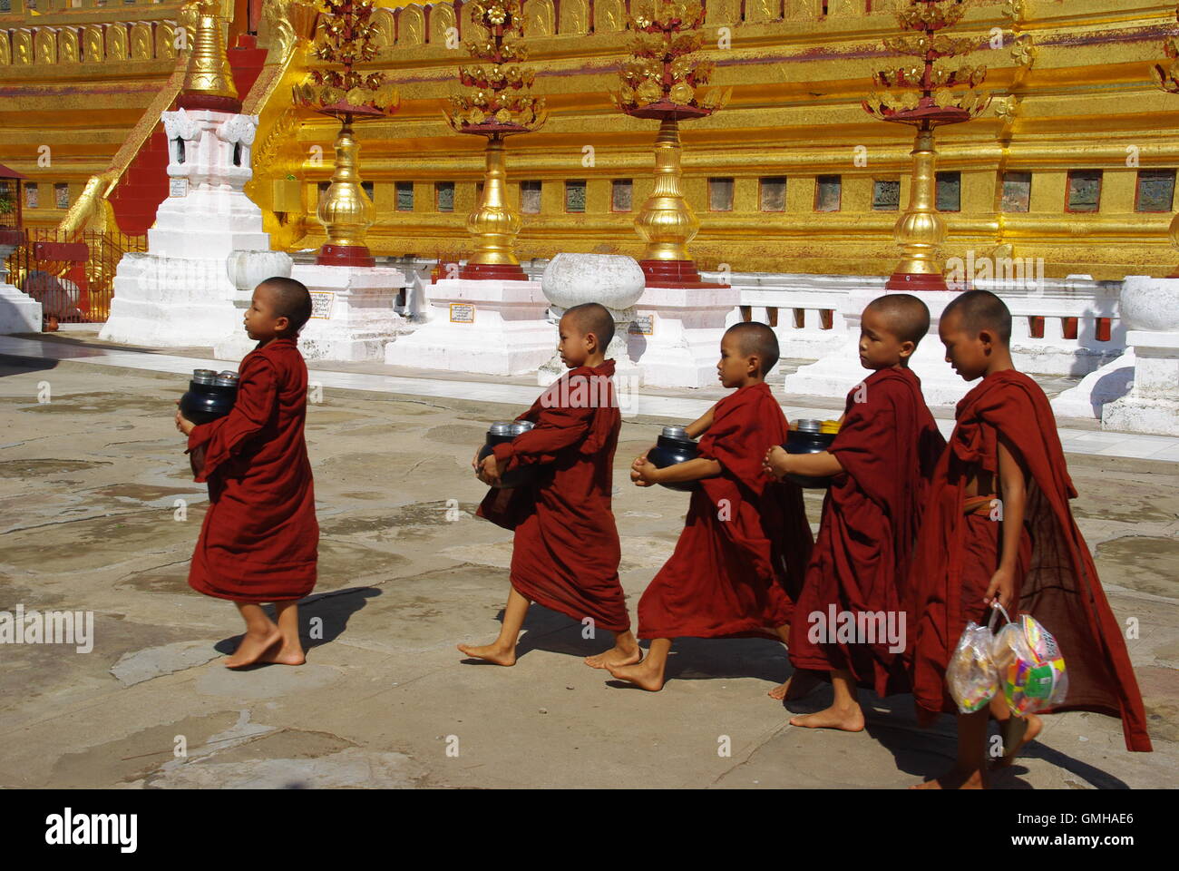 Boy Monks at Shwezigon Pagoda, Bagan, Myanmar Stock Photo