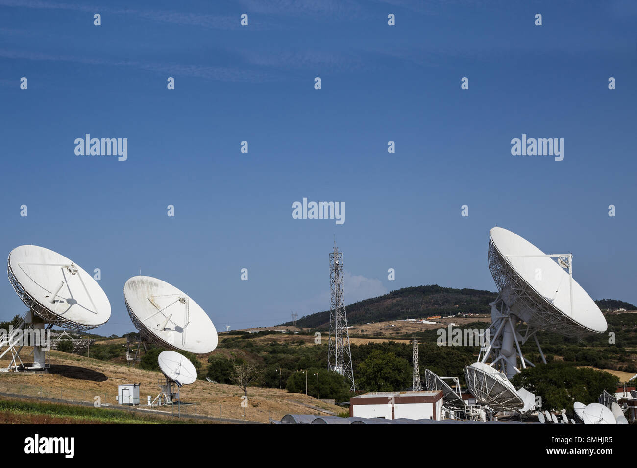 Array of satellite dishes for telecommunications Stock Photo