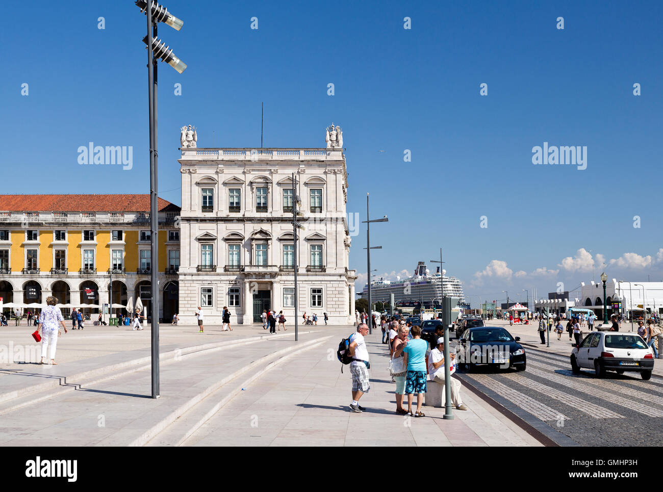 View of the east side of the Commerce Square, cruise ship and tourists visiting Lisbon, Portugal Stock Photo