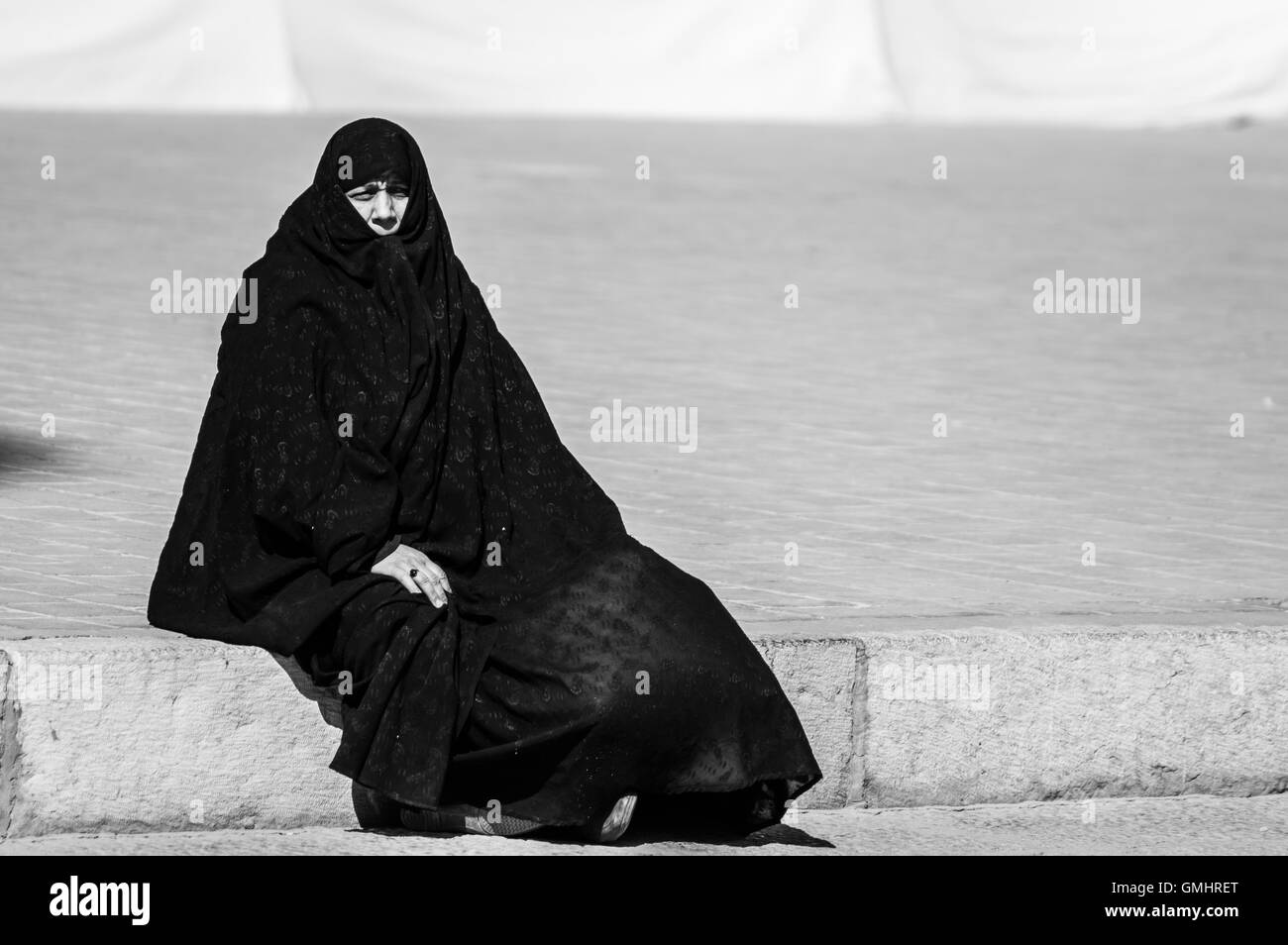 Esfahan, Iran - February 2016 - Muslim woman with traditional chador on the street. Iran, 2016 Stock Photo