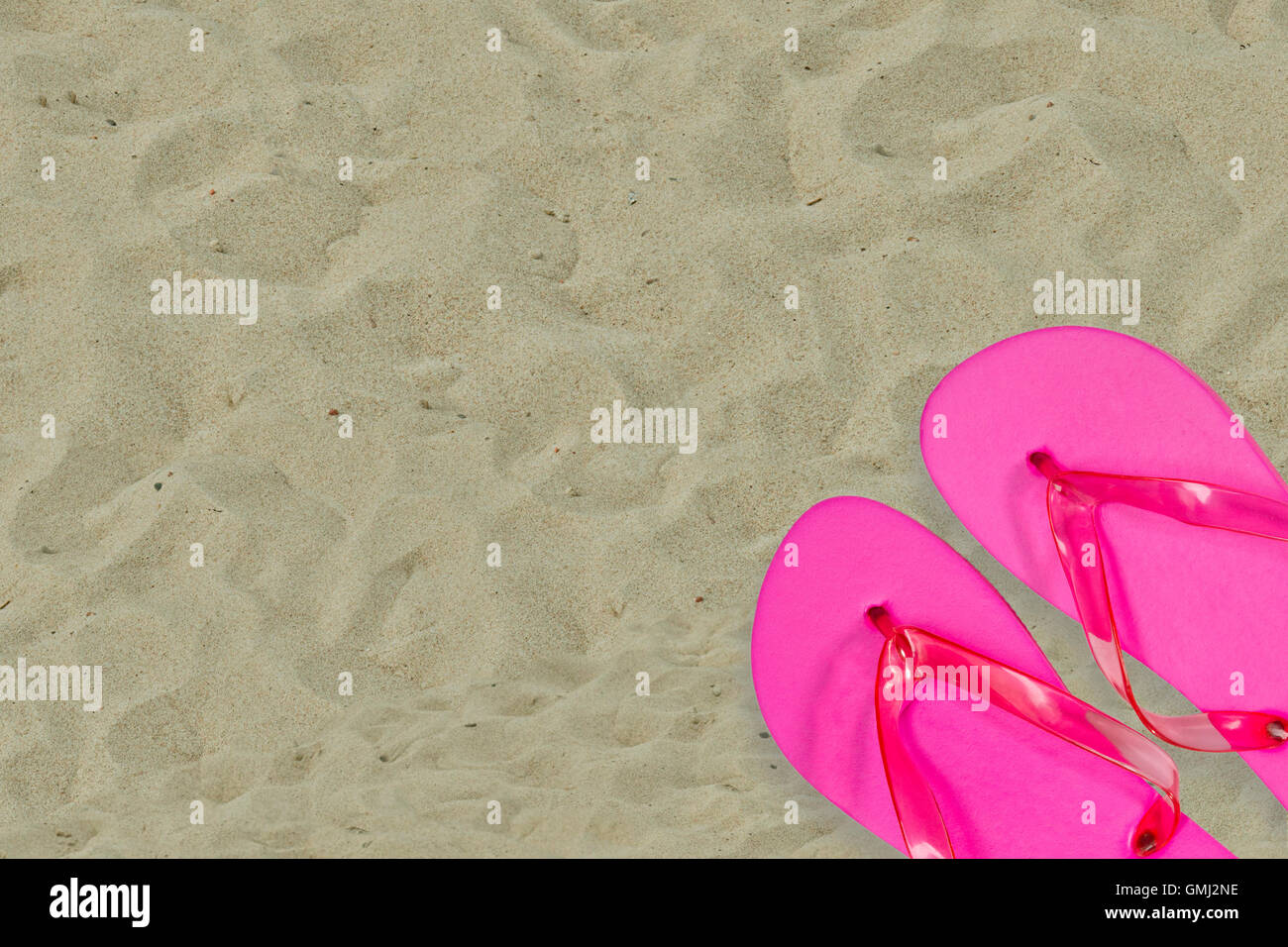 Pink Flip Flops in Detail on Sand Stock Photo - Alamy