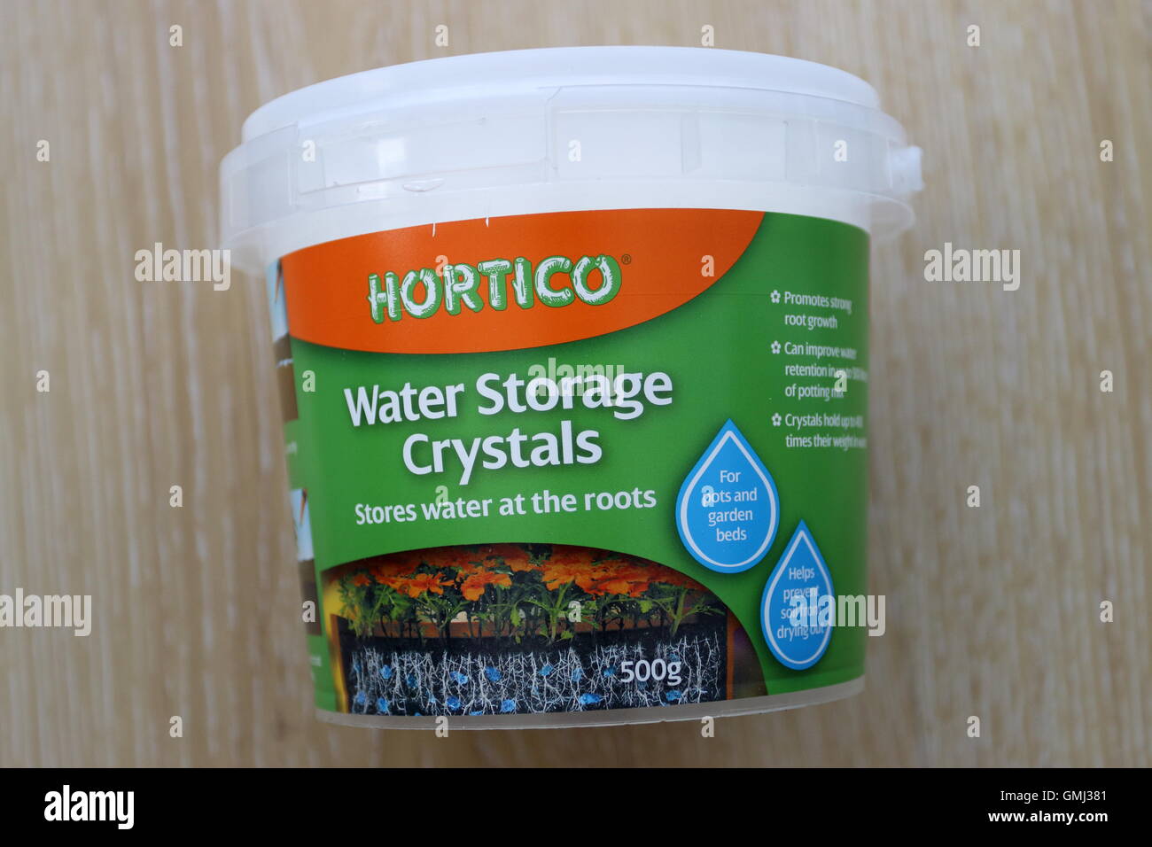 Hortico Water Storage Crystals on wooden background Stock Photo