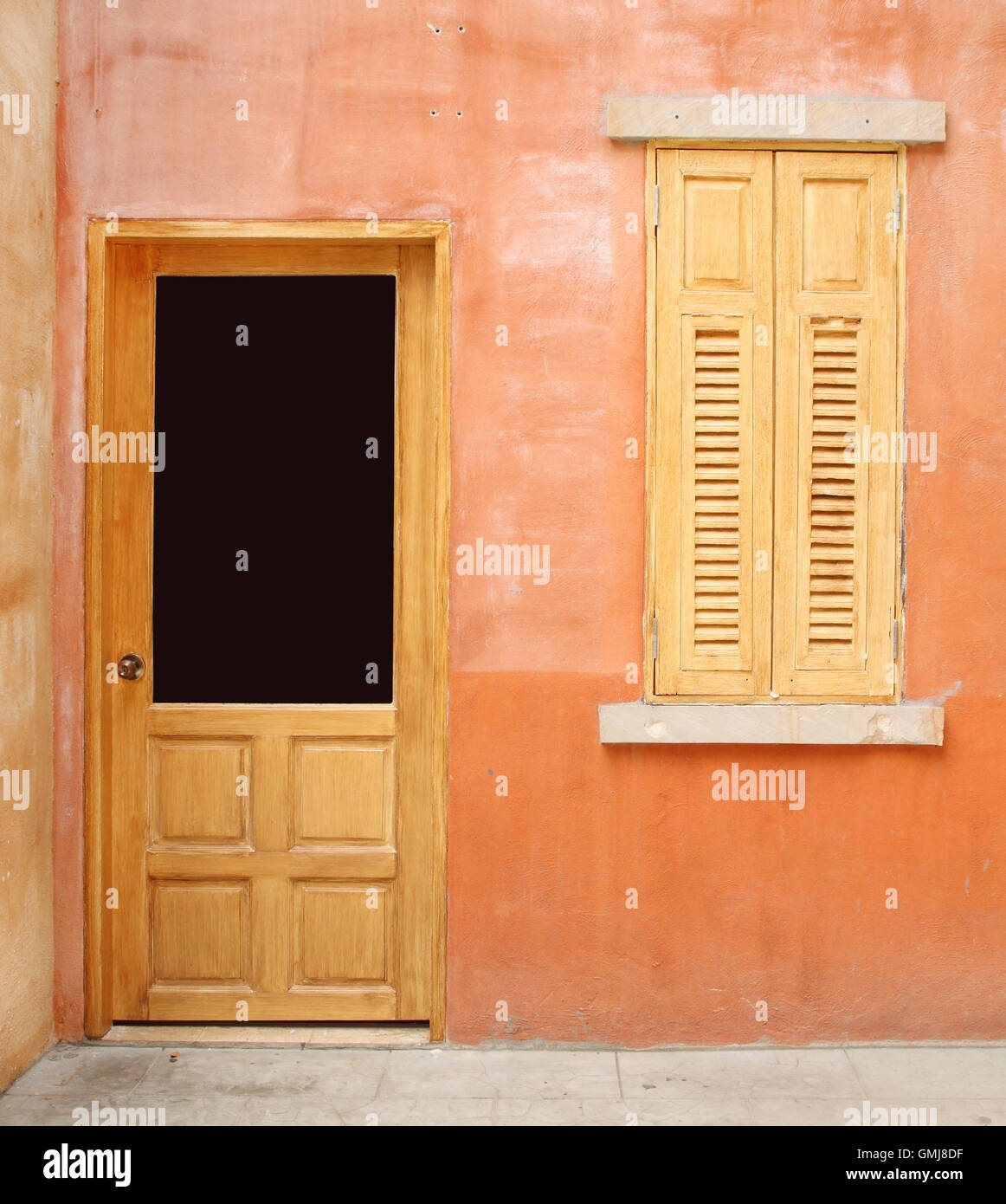 vintage door and window on wall background Stock Photo - Alamy