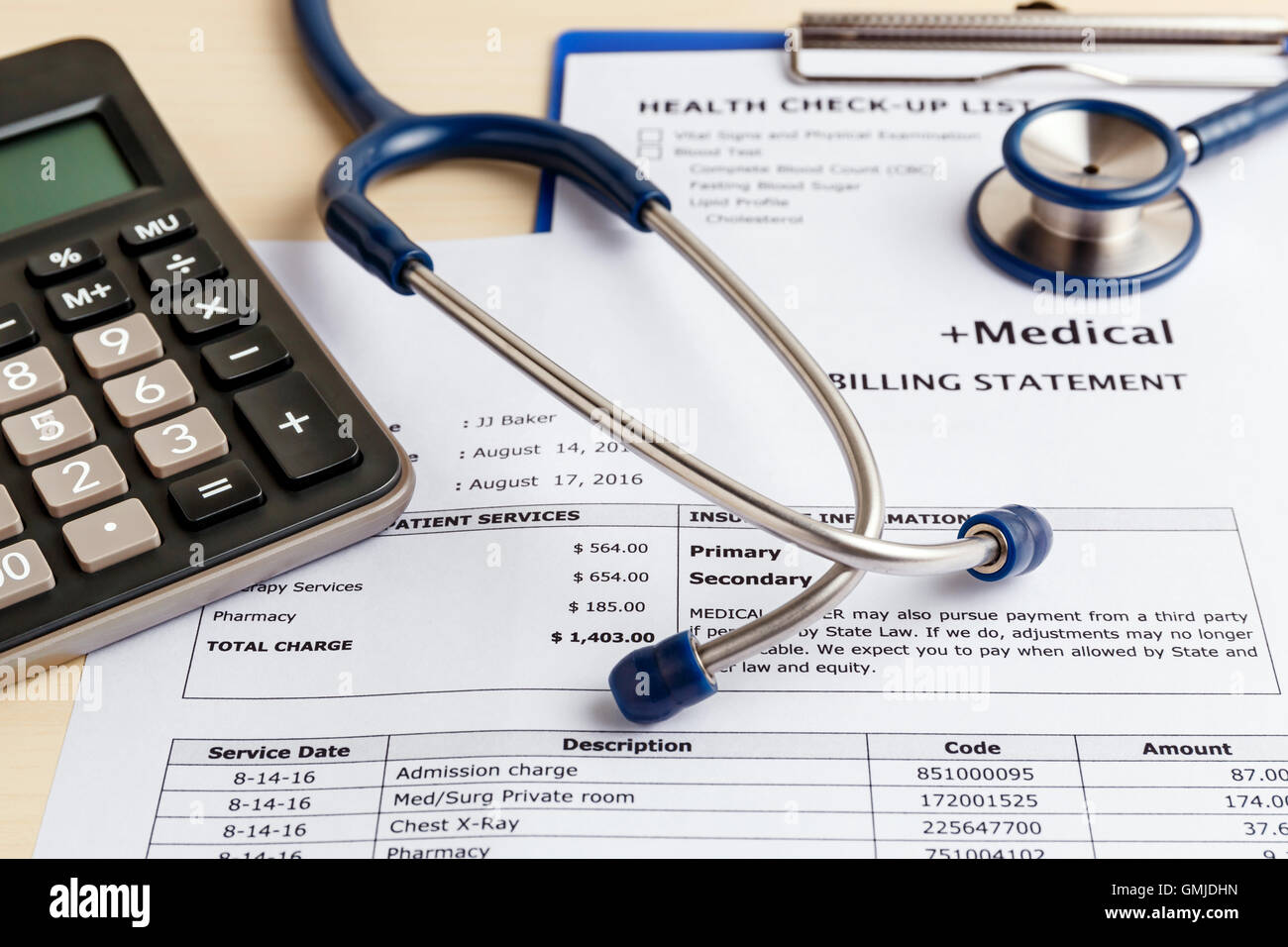 Medical cost concept with calculator and stethoscope Stock Photo Alamy