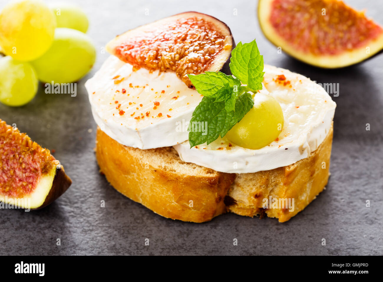 fresh baguette with creamy goat cheese and figs Stock Photo Alamy
