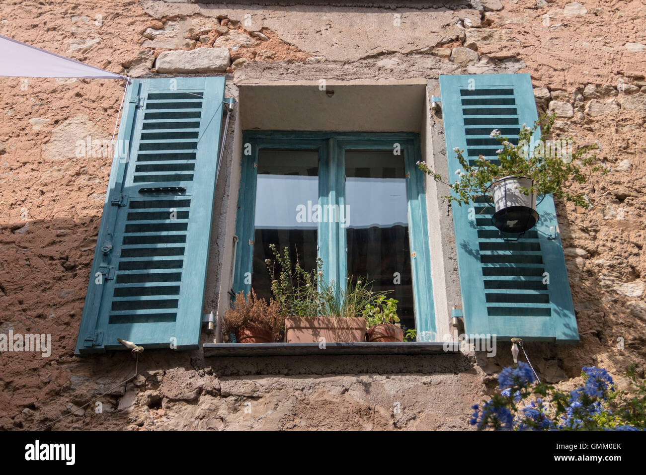French house with blue green shutters Stock Photo - Alamy