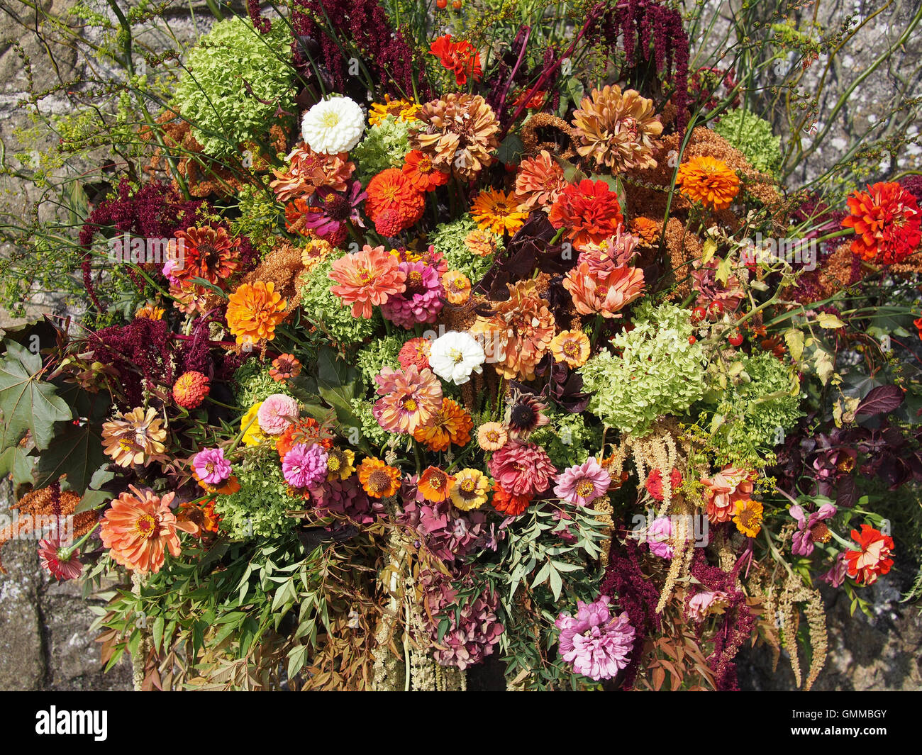 Beautiful autumn colours, large floral arrangement. Wild and cultivated flowers. Stock Photo