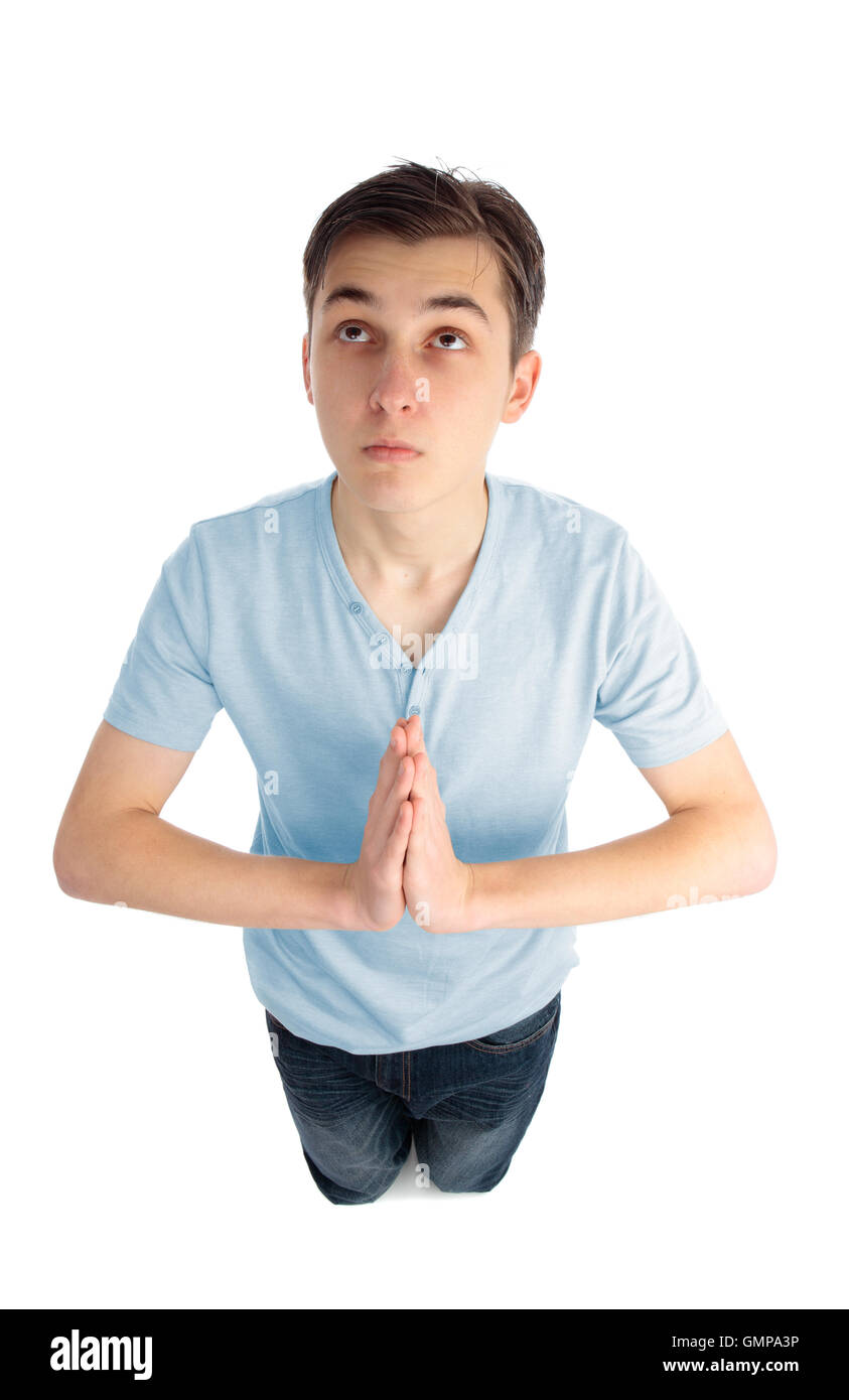 Kneeling in prayer Stock Photo Alamy