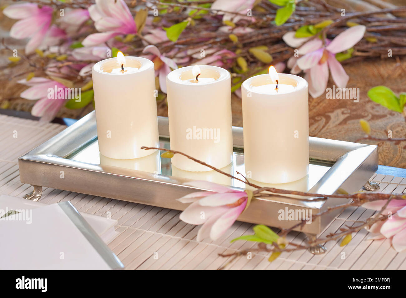 Elegant candles and flowers Stock Photo Alamy