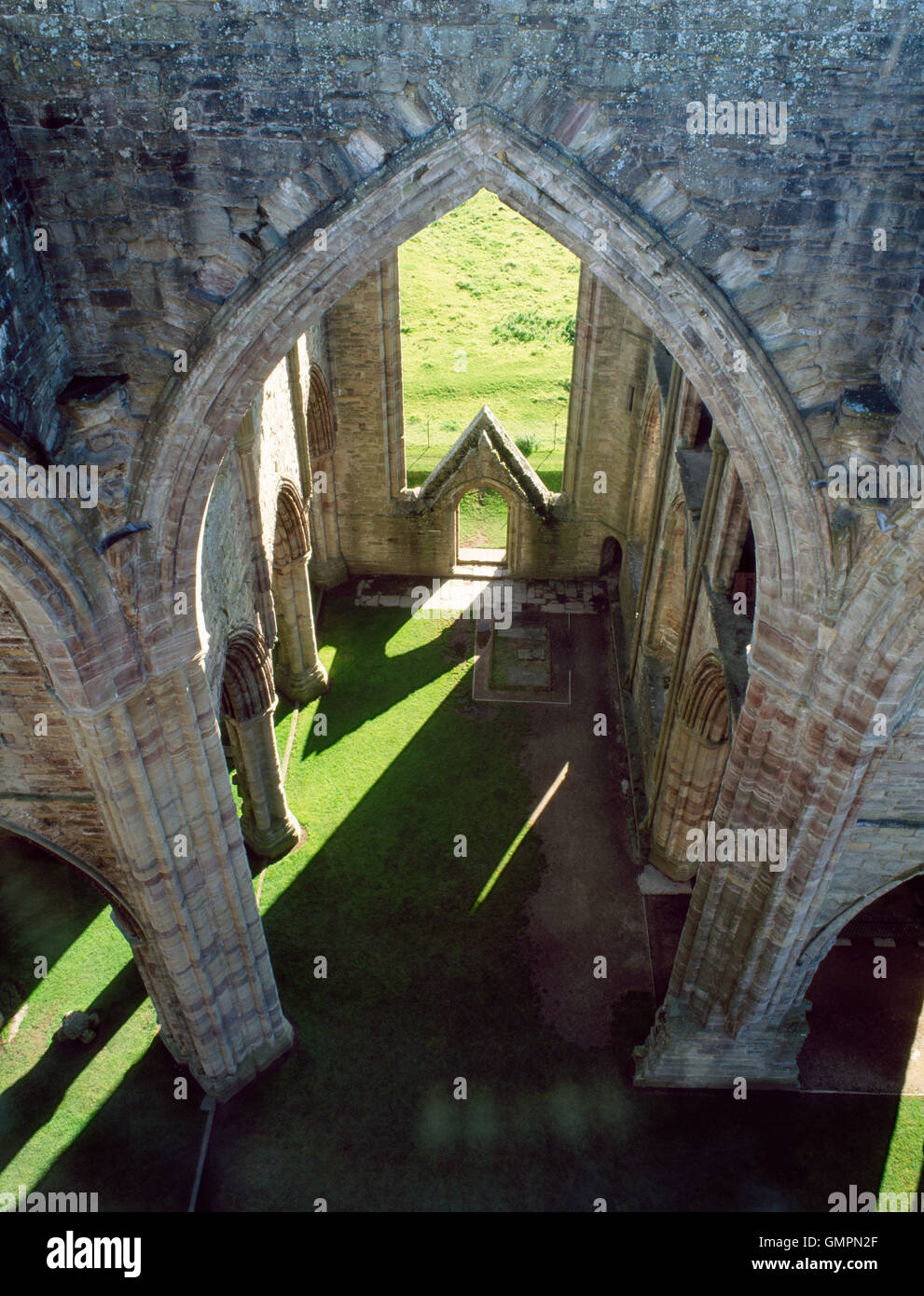 Looking down into the crossing, south transept, S entrance & S aisles of Tintern Abbey church, Monmouthshire, with the chancel (L) & nave (R). Stock Photo