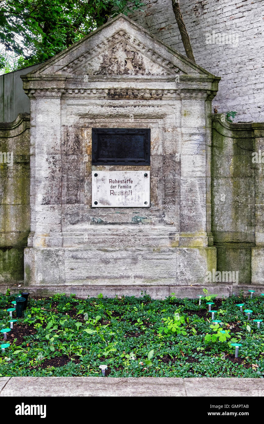 Stone grave of the Russell family & green tags denoting other burials