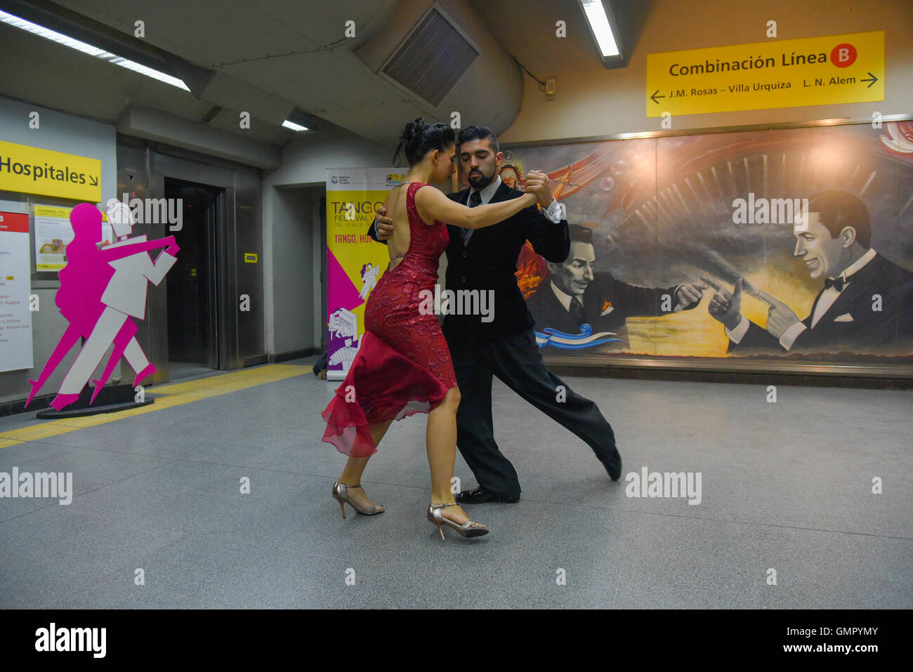 Buenos Aires, Argentina - 22 Aug 2016: Couple performs during the Tango Buenos Aires Festival in the subway station. Stock Photo