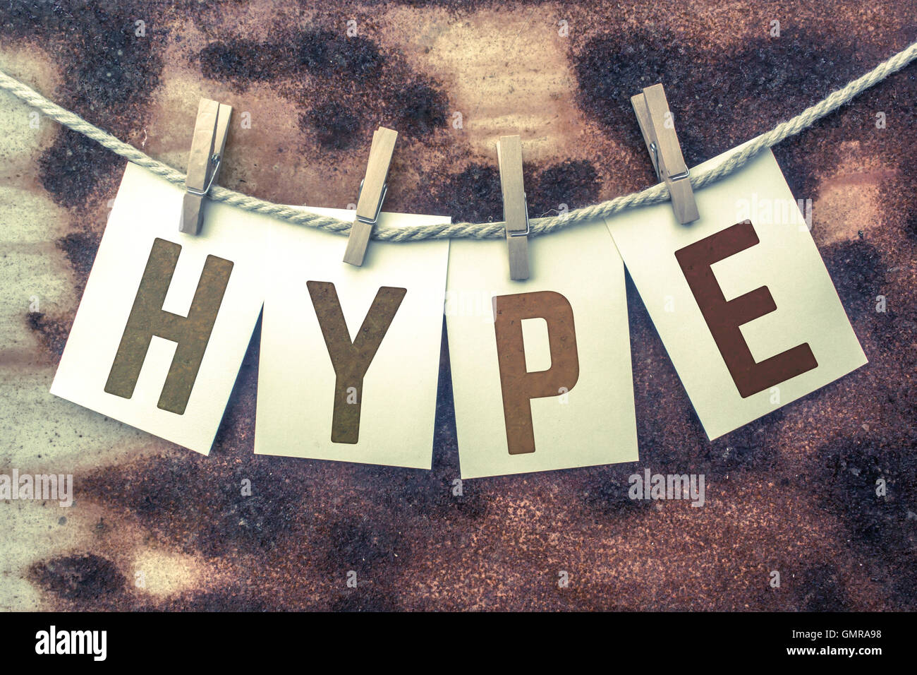 The Word Hype Stamped On Cards And Pinned To An Old Piece Of
