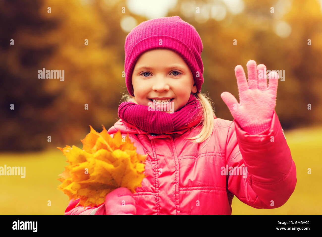 happy beautiful little girl portrait outdoors Stock Photo - Alamy