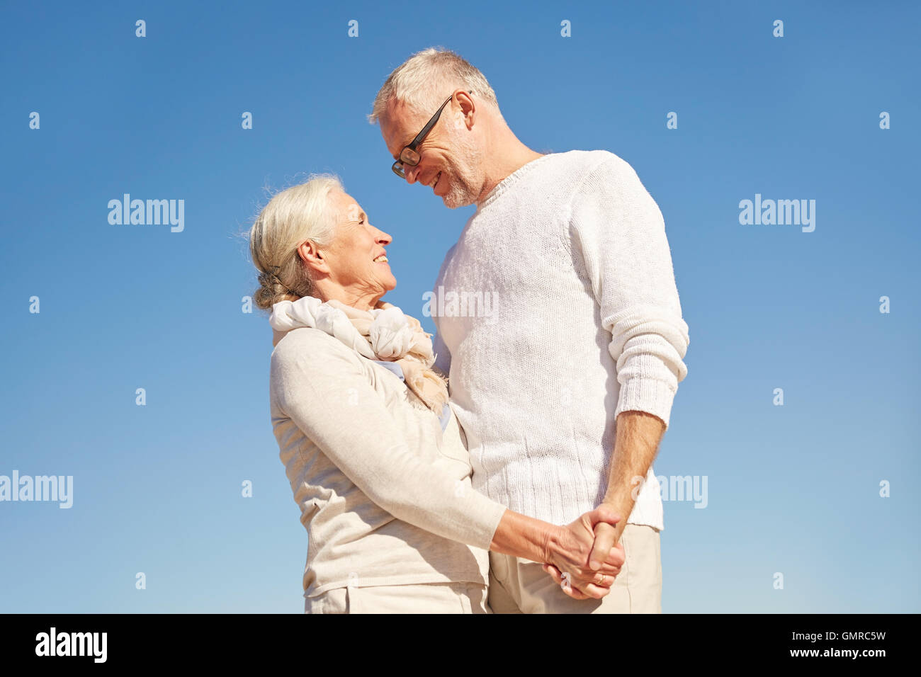 Man woman talking holding hands hi-res stock photography and images - Alamy
