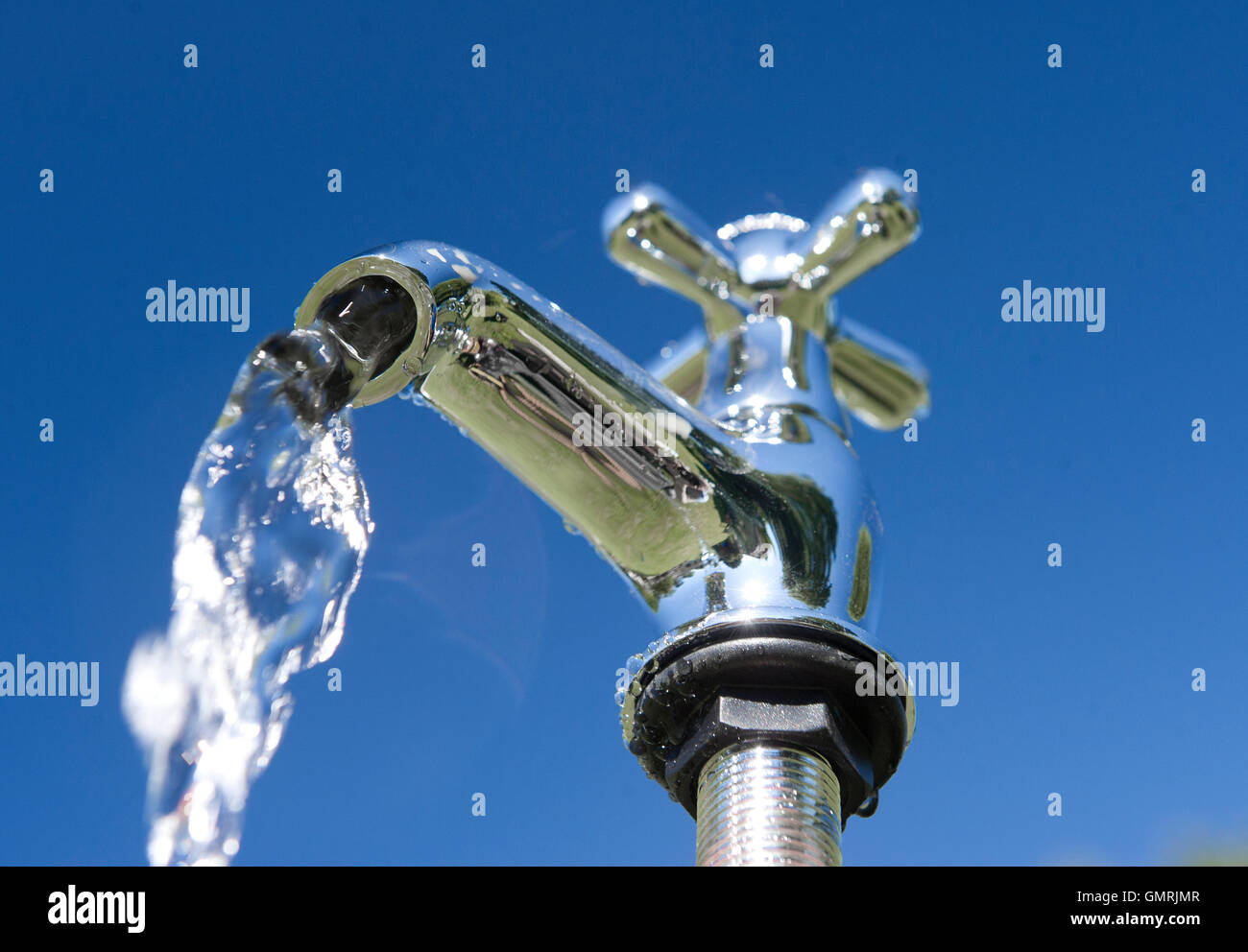 Fresh drinking water dripping and pouring from a tap Stock Photo Alamy