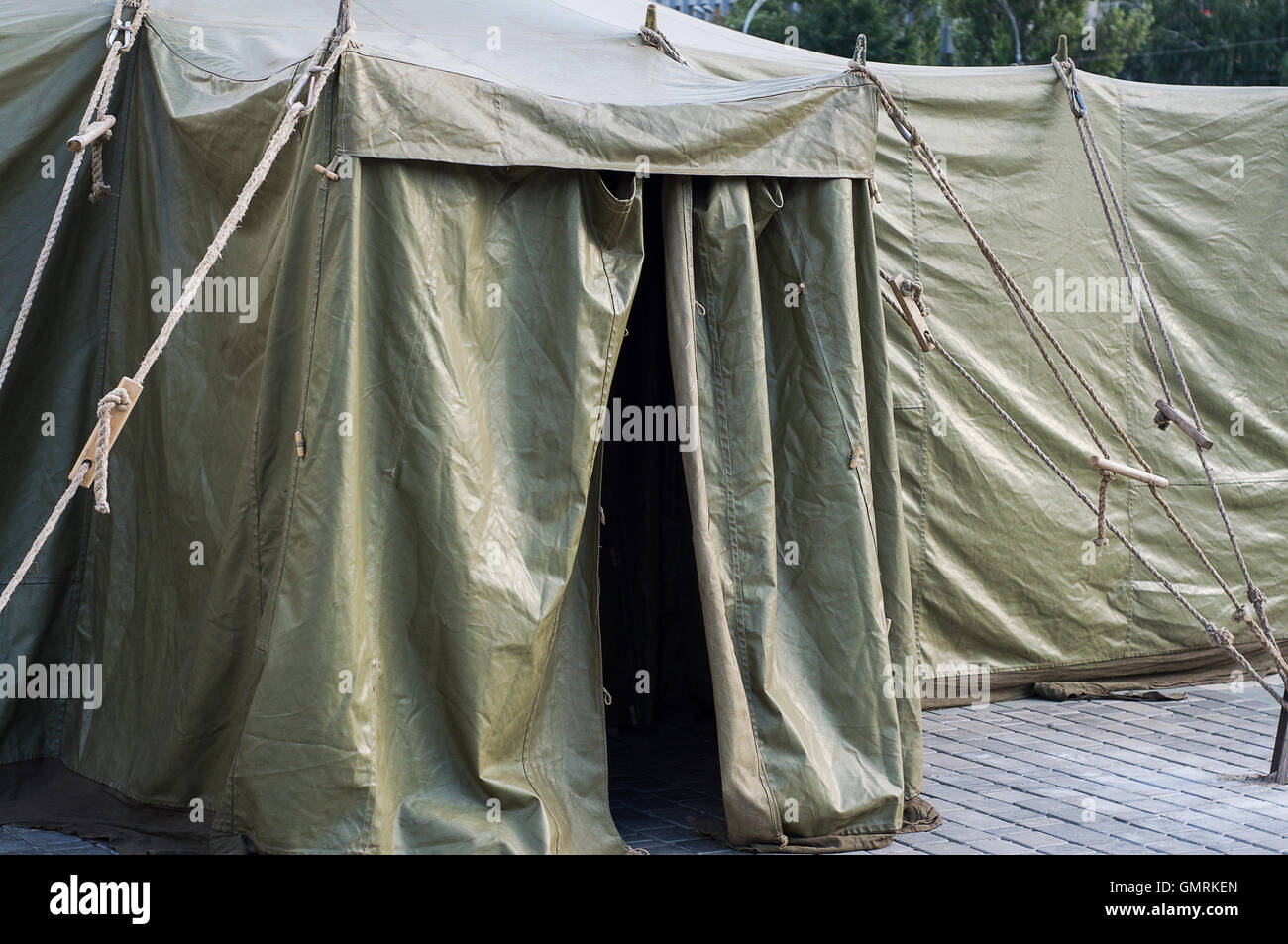 Entrance to the military tent, standing on the pavement Stock Photo