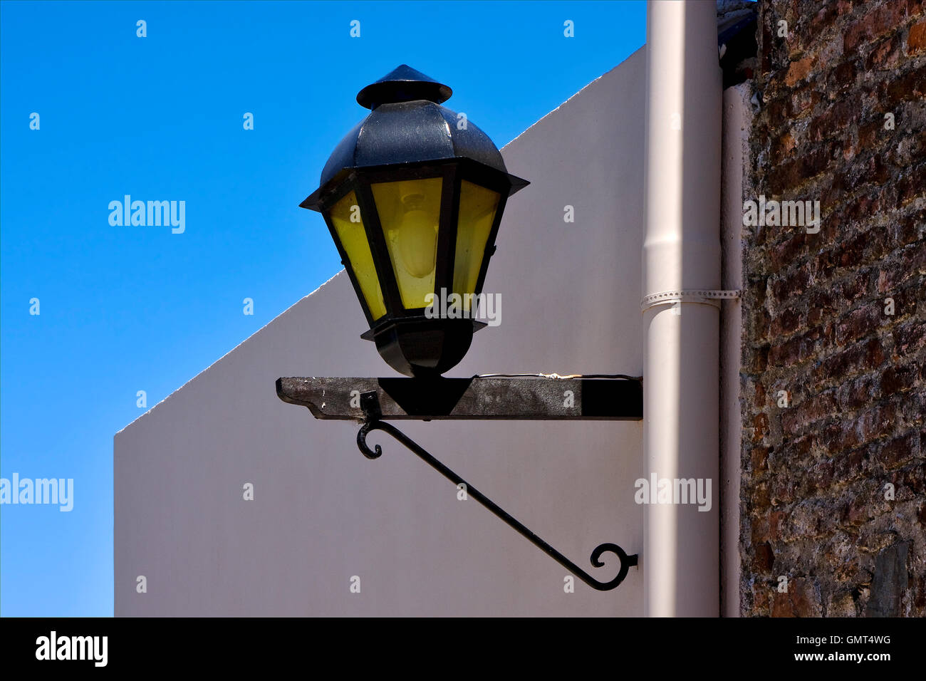 street lamp and a water pipe in colonia del sacramento Stock Photo