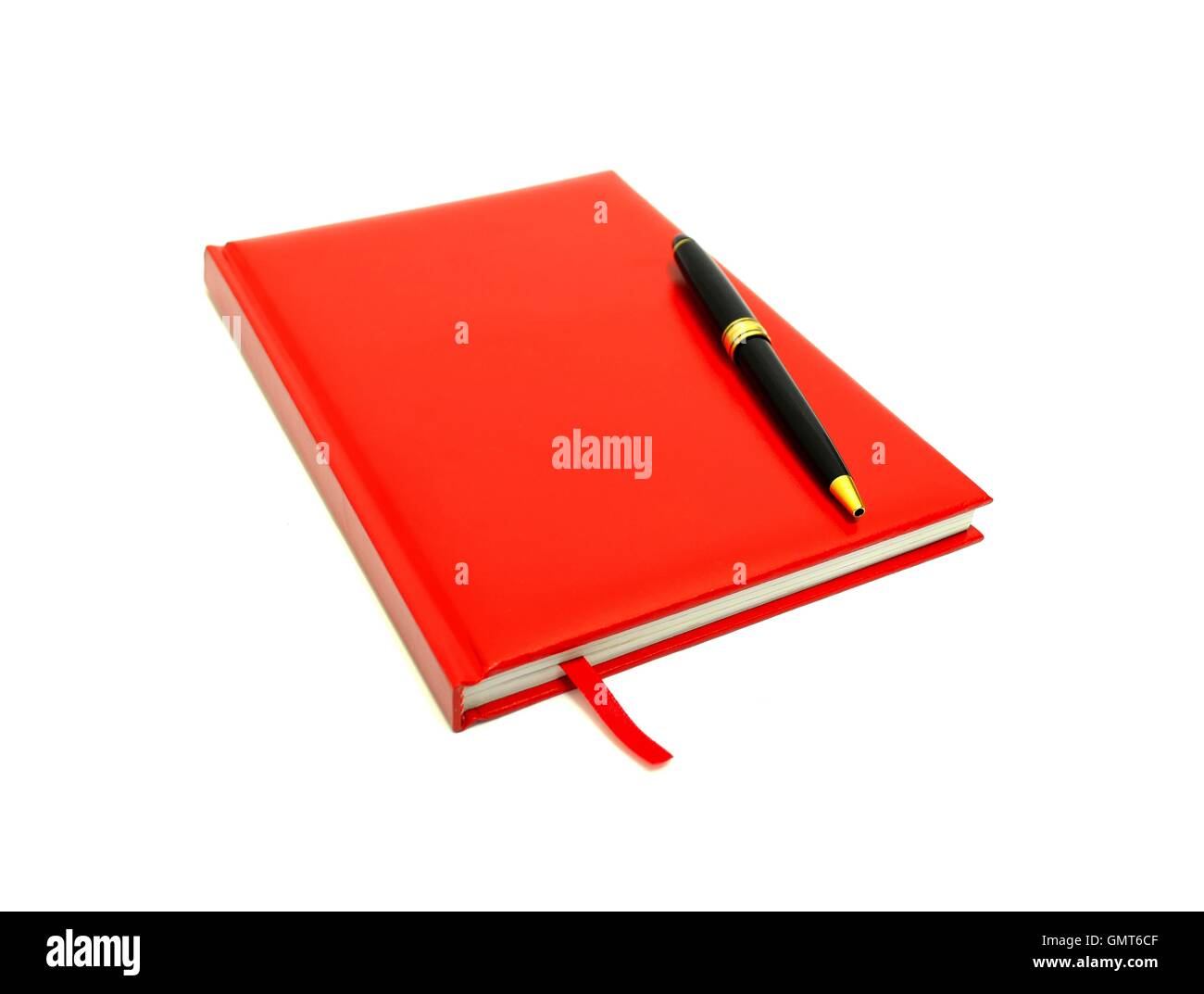 Red diary and pen on a white Stock Photo