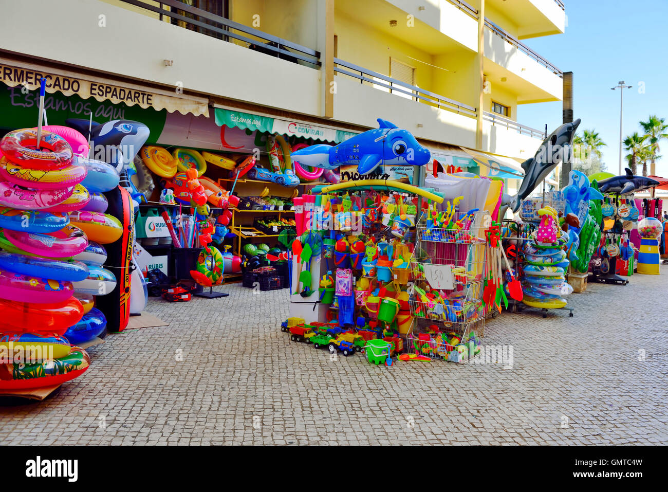 Seafront shops in Quarteira, Algarve, south Portugal Stock Photo