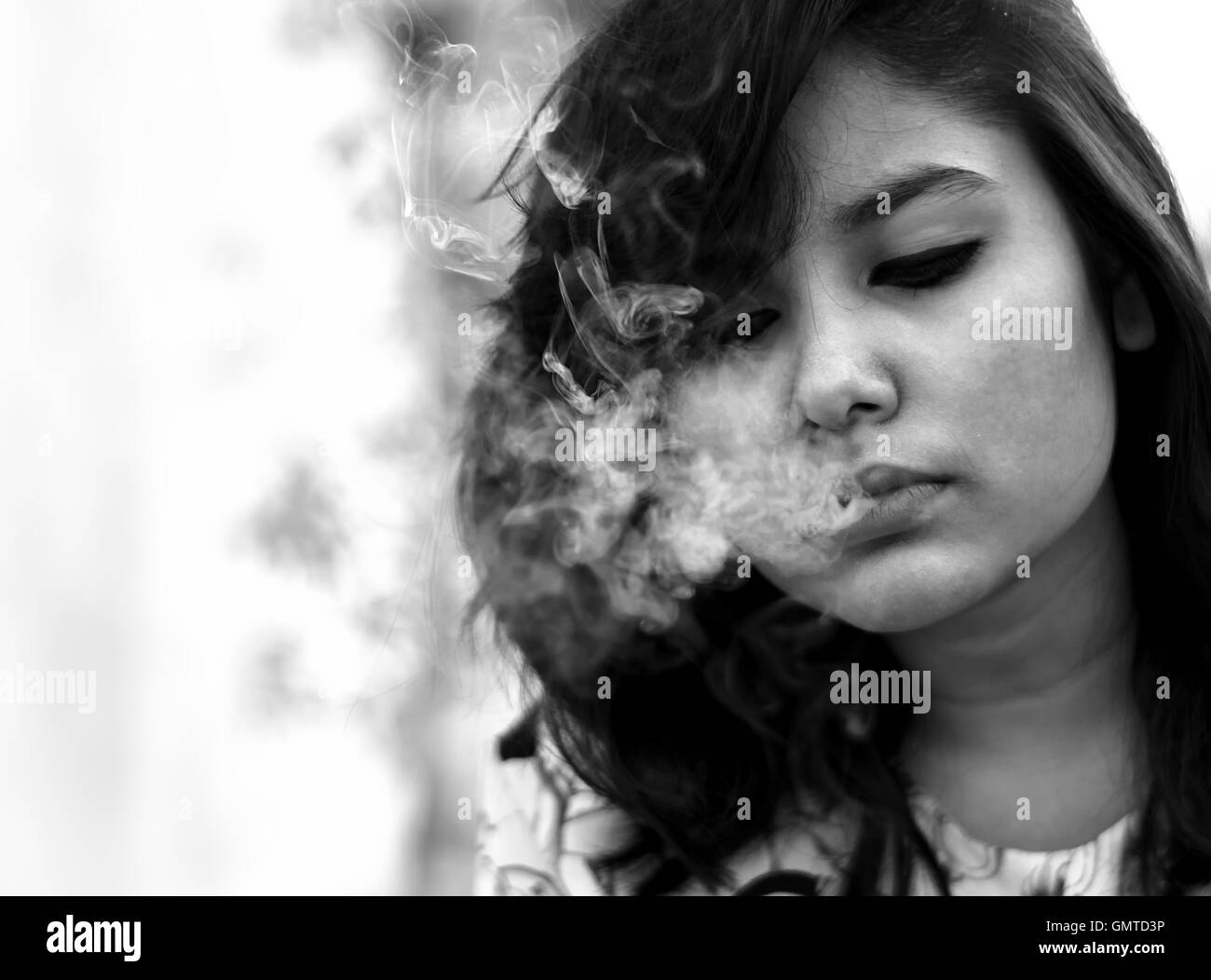 Girl smoking Stock Photo