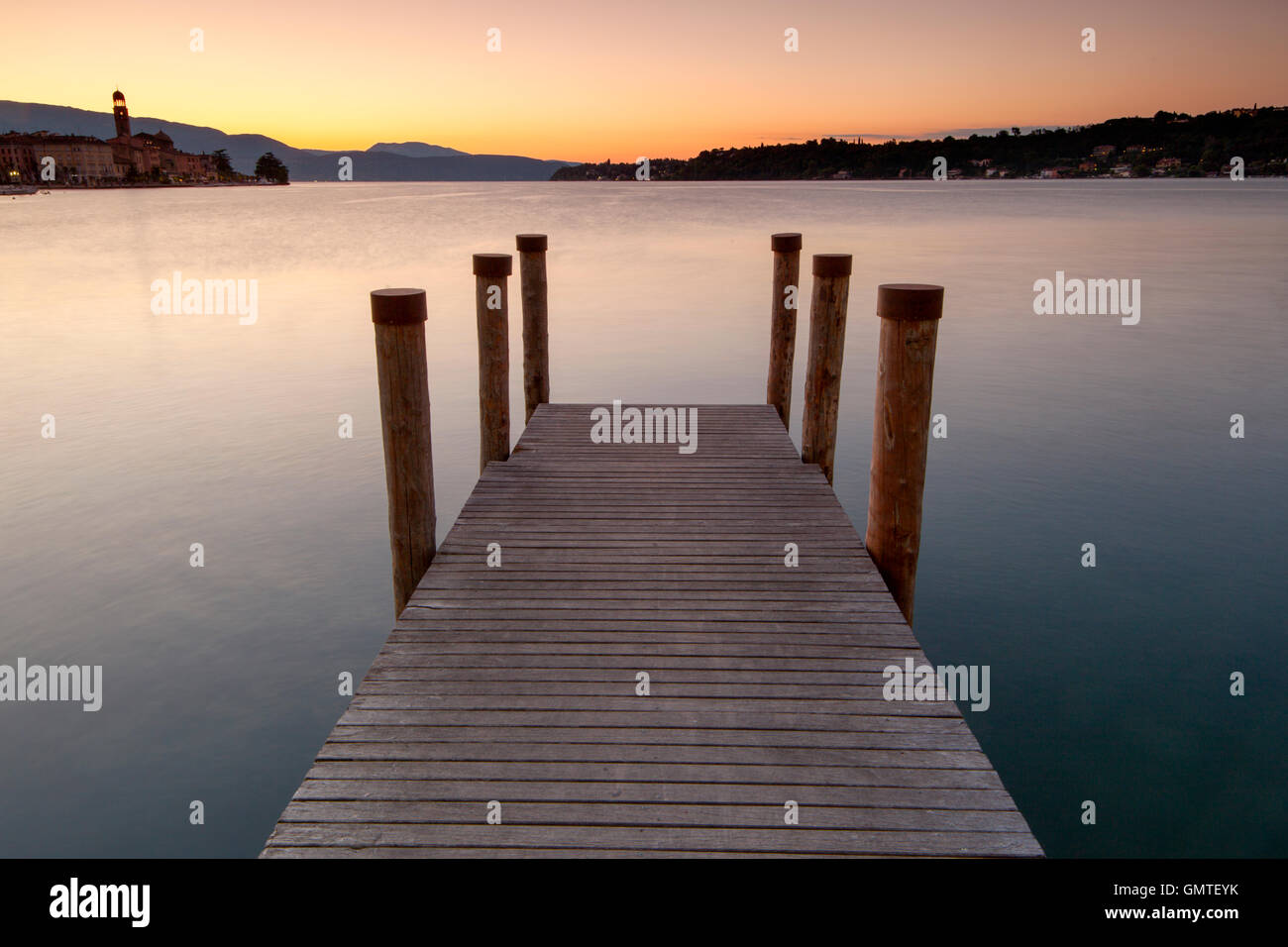 Jetty in Salo, Lake Garda, Brescia, Italy, at dawn. Stock Photo