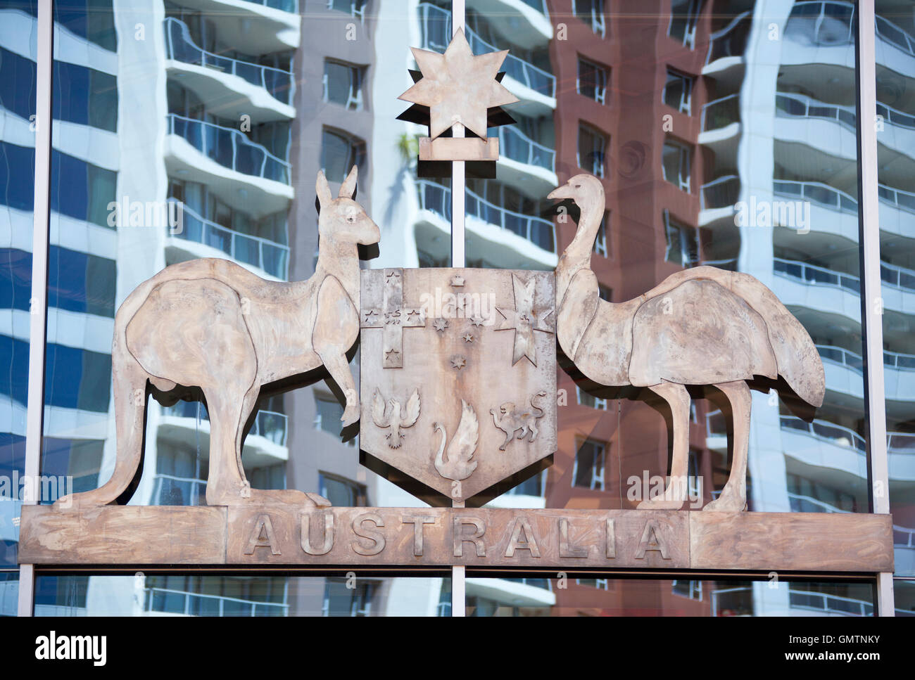 The official Australia's state emblem hanging on a window of a